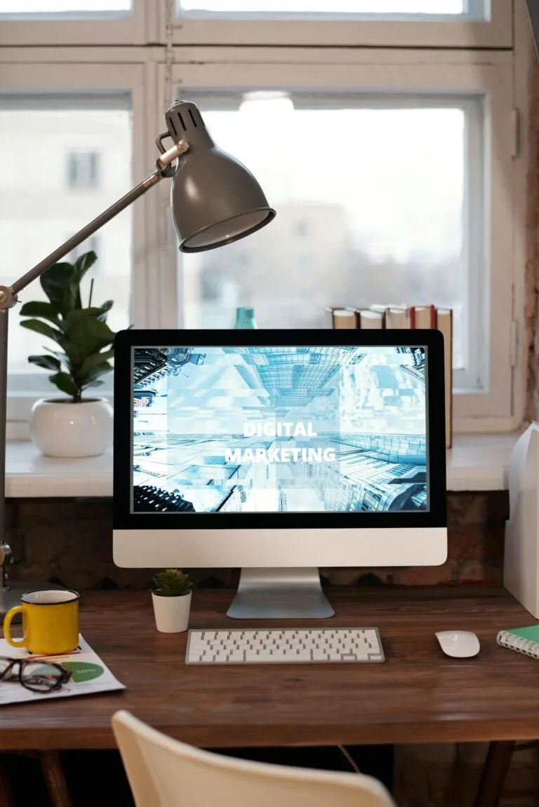 Crafting Blog Structure: A Guide for Effective Blogging Contemporary home office desk with digital marketing screen, perfect for remote work inspiration.
